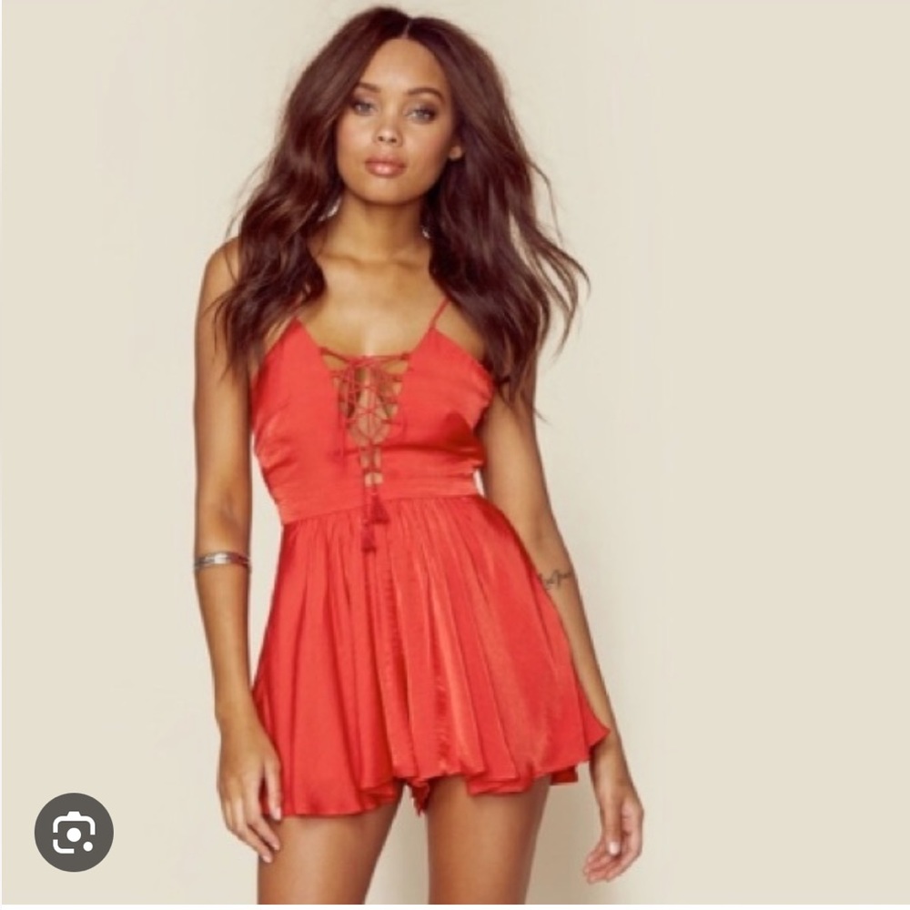 The Jetset Diaries Lotus romper in red